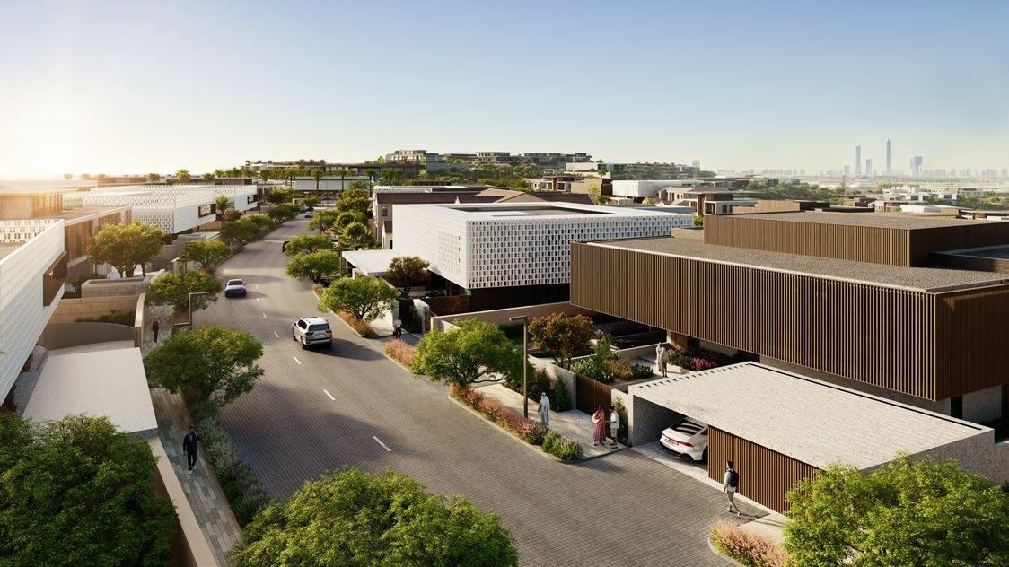 Luxury street view of Nawayef West villas with elevated hill landscape in Abu Dhabi
